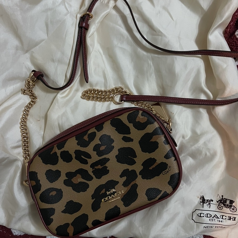 Coach Leppard Printed crossbody/shoulder bag
New without tags